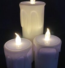 Drie druipende kaarsen